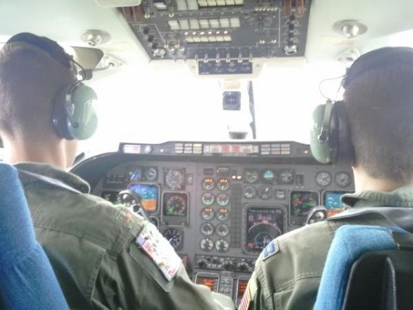 Shane flying right seat in Jayhawk